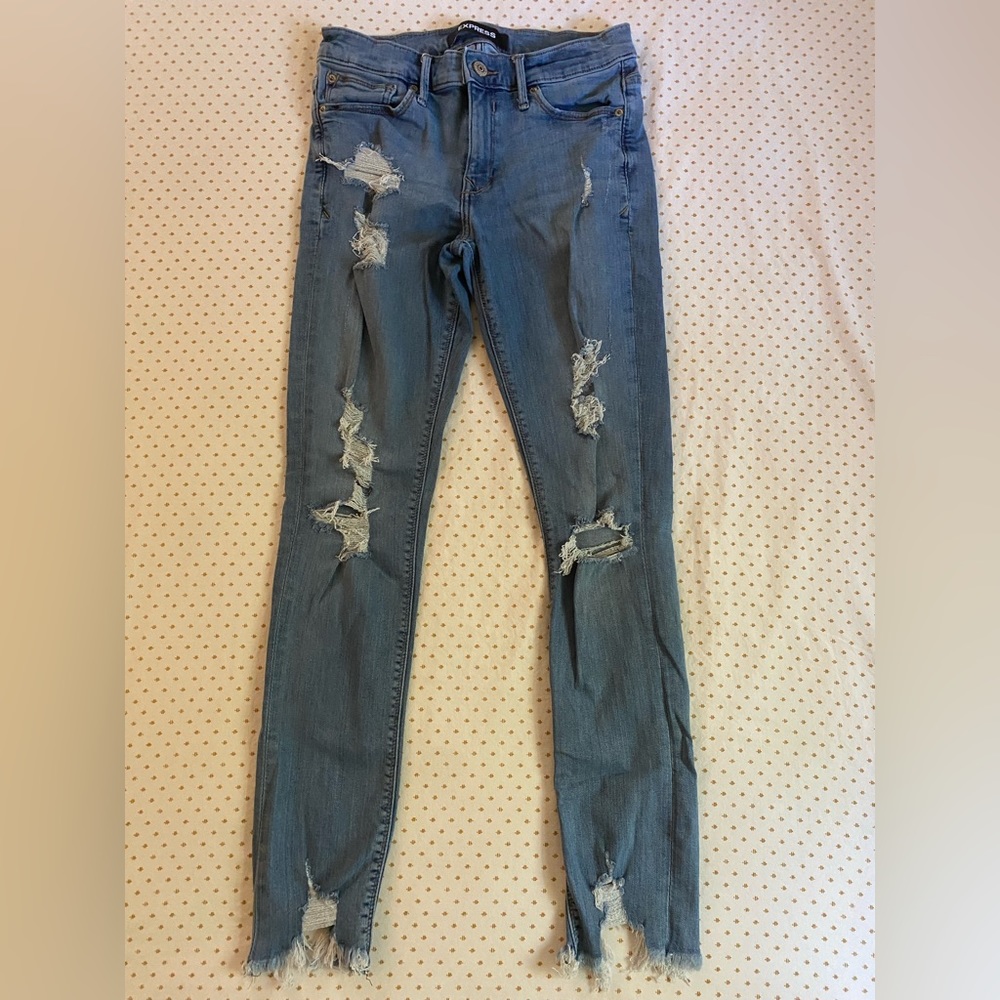 Express woman’s size 8 distressed jeans